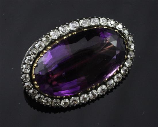 An Edwardian gold and silver, amethyst and diamond oval brooch, 1.25in.